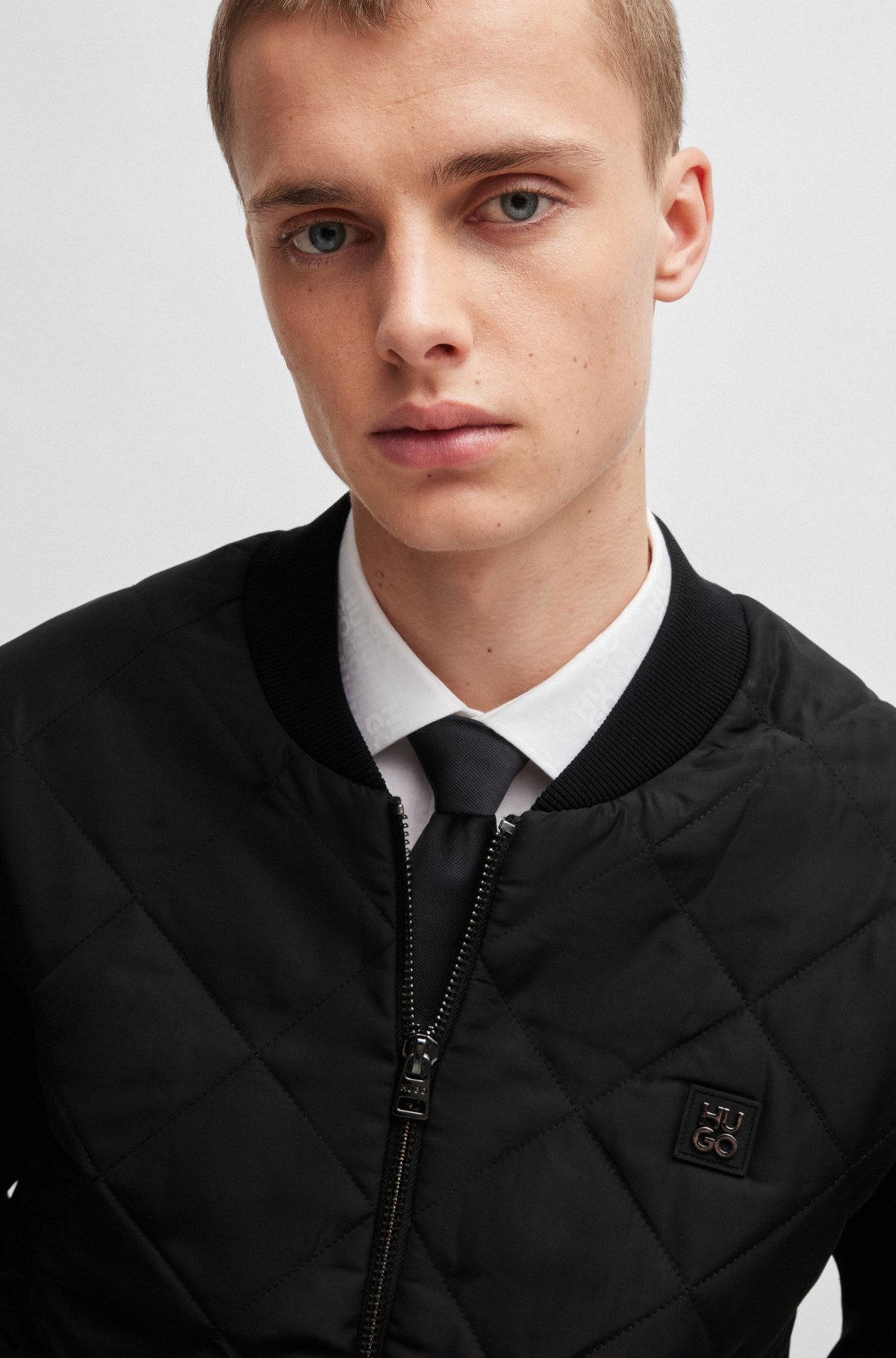 HUGO - Mixed-material jacket with stacked-logo trim - Black HUGO - Mixed-material jacket with stacked-logo trim - Black