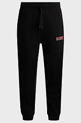 Cotton-terry tracksuit bottoms with logo print, Black