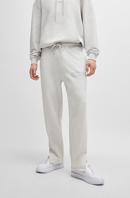 Loose-fit cotton-terry tracksuit bottoms with outline logo, Light Grey