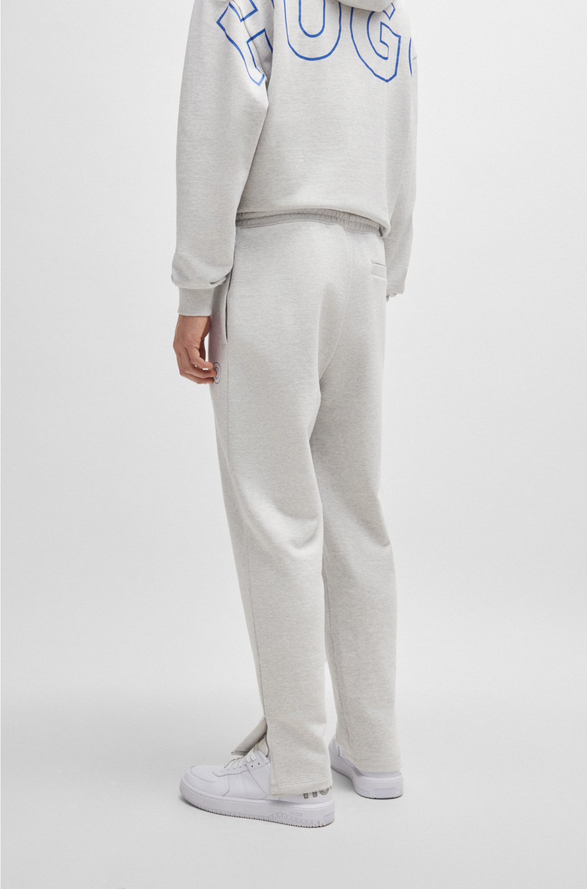 Loose-fit cotton-terry tracksuit bottoms with outline logo, Light Grey
