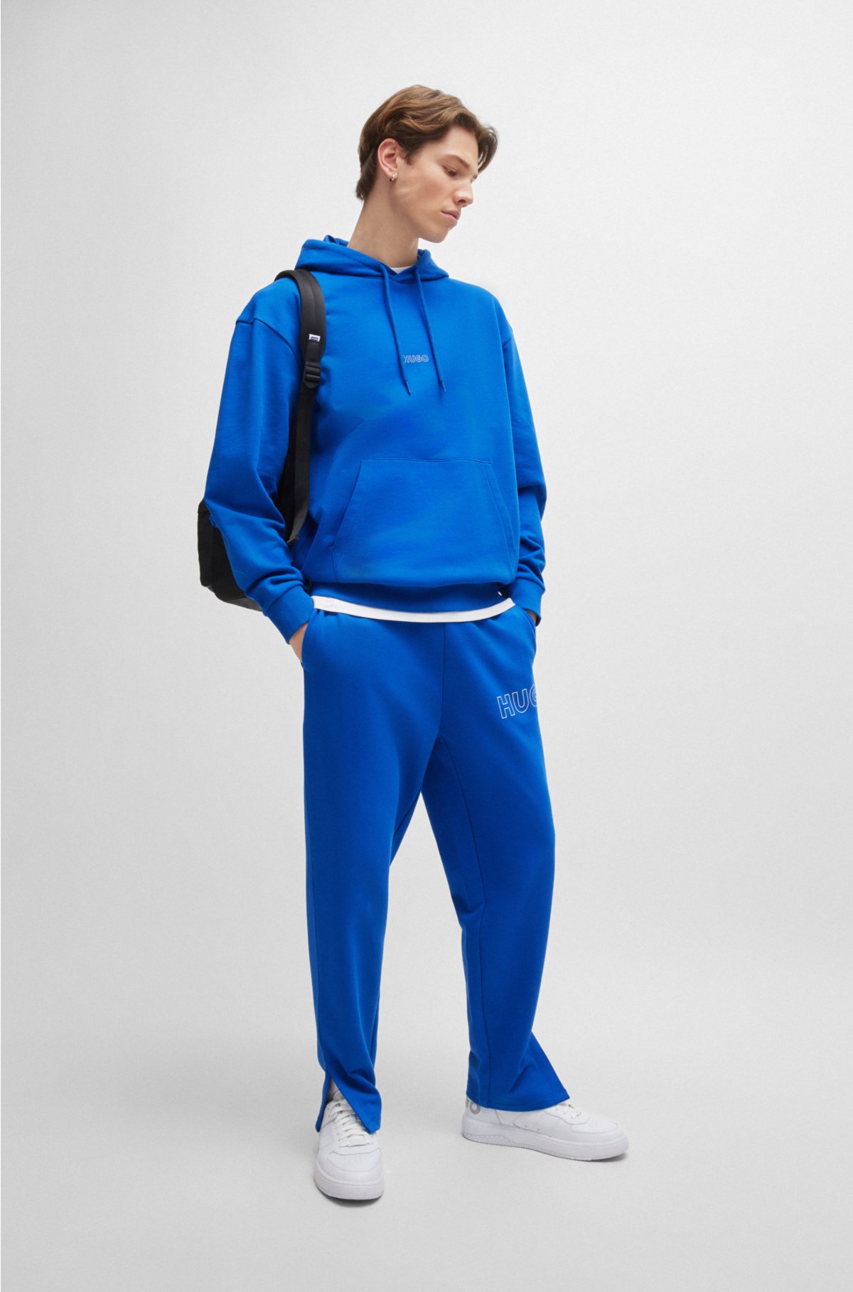 Loose-fit cotton-terry tracksuit bottoms with outline logo, Blue