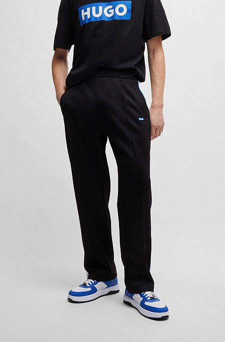 Logo-patch tracksuit bottoms with tape trims, Black