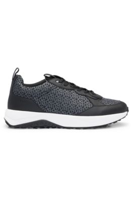 Mixed-material trainers with repeat-logo details, Black