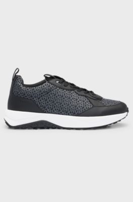 Mixed-material trainers with repeat-logo details, Black