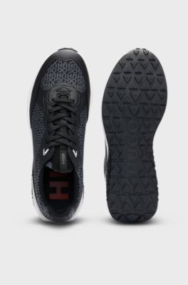 Mixed-material trainers with repeat-logo details, Black