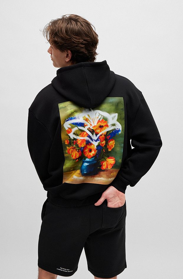 Cotton-blend oversized-fit hoodie with floral artwork, Black