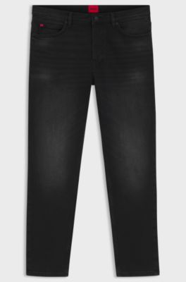 Jeans con fit affusolato in denim elasticizzato nero, Nero