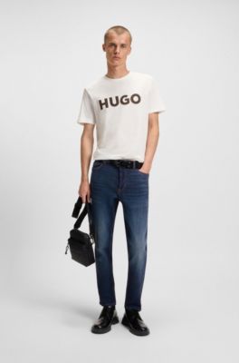 Jeans con fit affusolato in denim elasticizzato blu scuro, Blu scuro