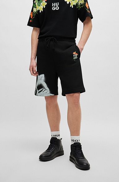 Relaxed-fit cotton-blend shorts with floral artwork, Black
