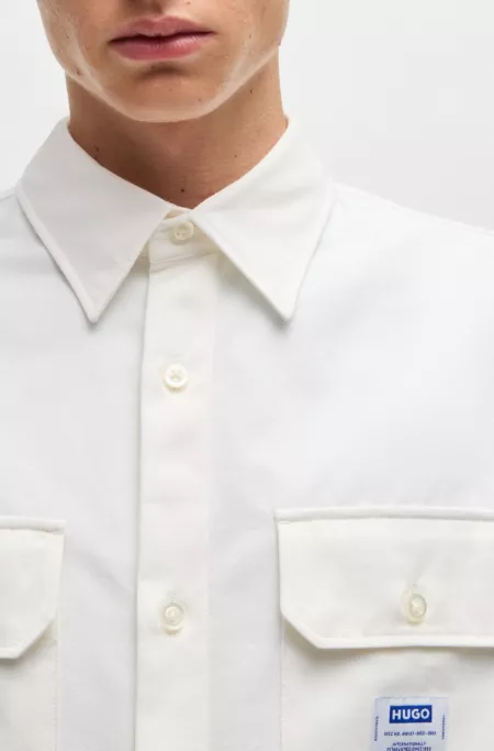 Oversized-fit shirt in cotton twill with logo patch