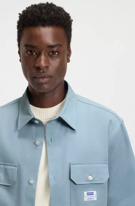 Oversized-fit shirt in cotton twill with logo patch