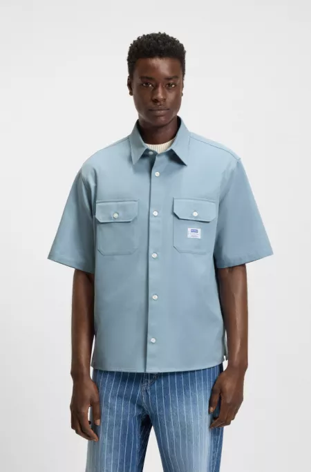 Oversized-fit shirt in cotton twill with logo patch