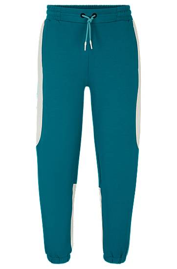Baggy-fit tracksuit bottoms in stretch fabric, Hugo boss