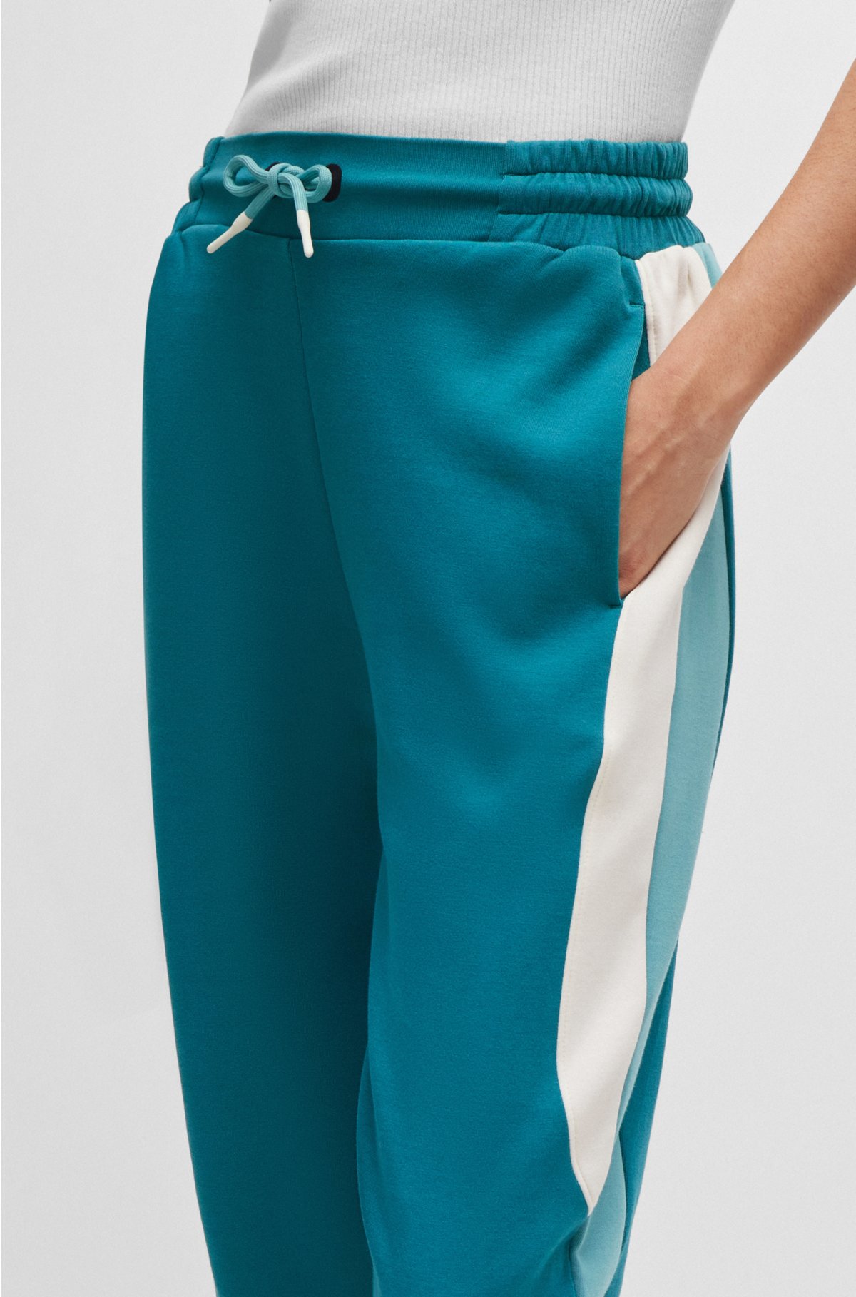 Baggy-fit tracksuit bottoms in stretch fabric, Petrol