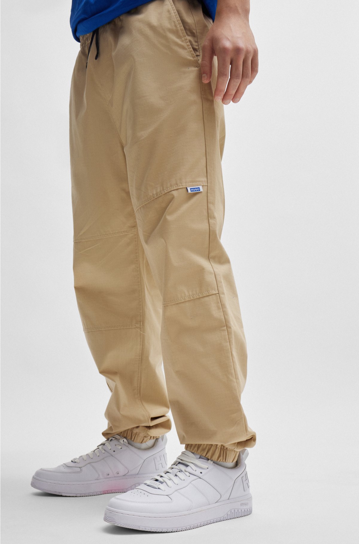 Tapered-fit trousers in structured cotton, Beige