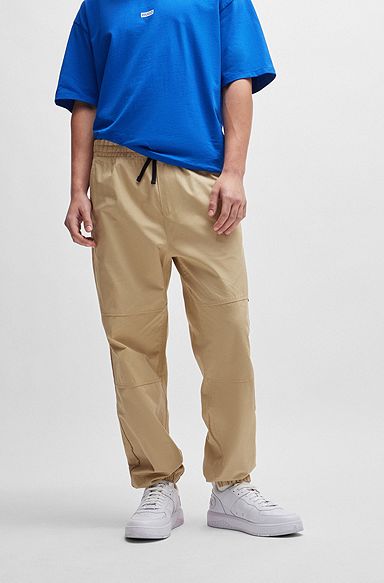 Tapered-fit trousers in structured cotton, Beige