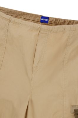 Oversized-fit parachute trousers in cotton with cargo pockets, Light Beige