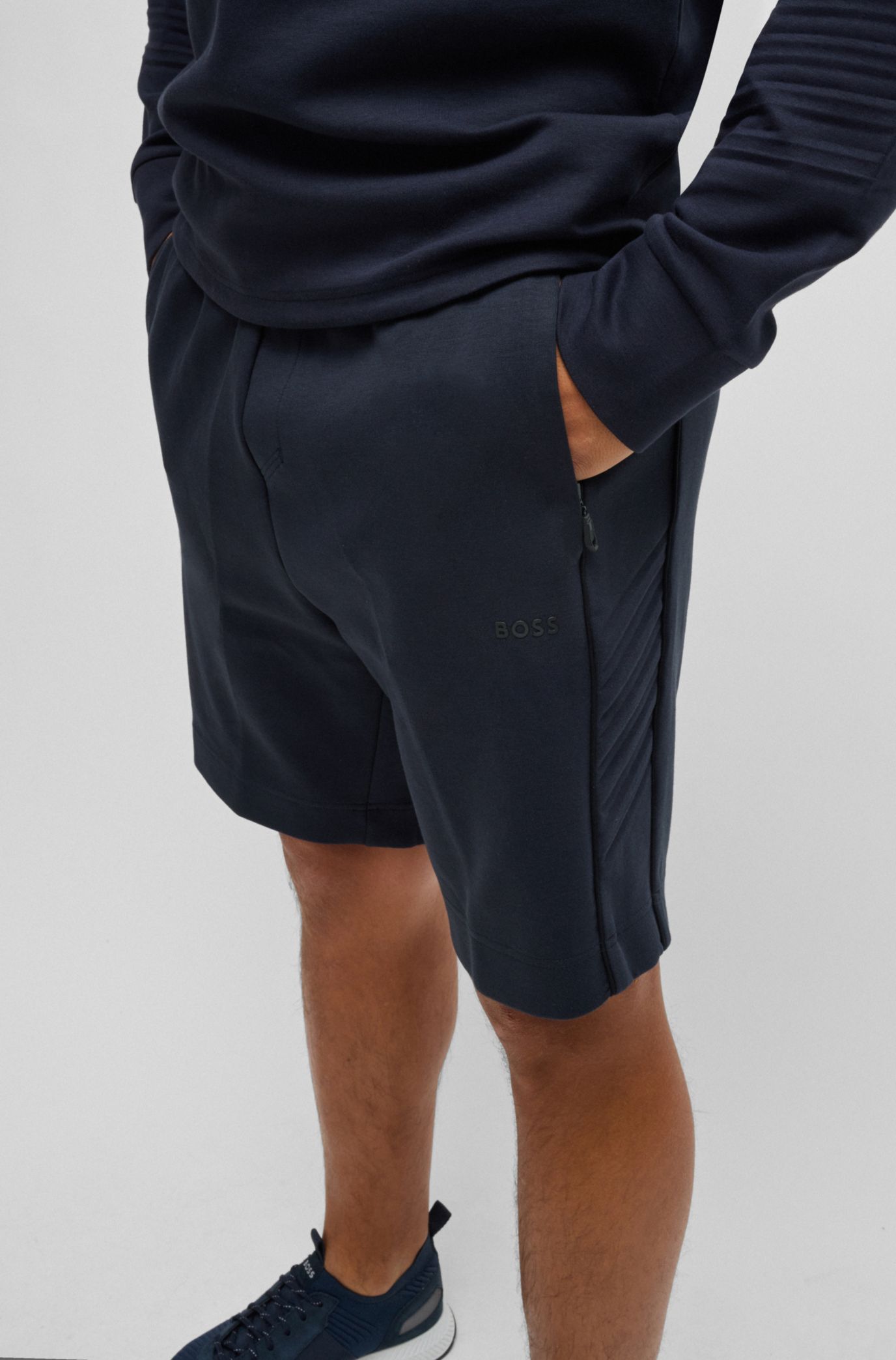 Stretch-cotton shorts with embossed artwork