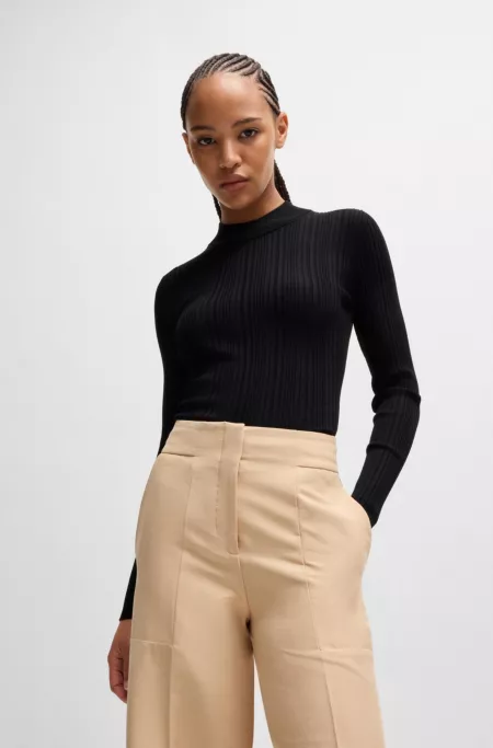 Slim-fit sweater with irregular ribbed structure