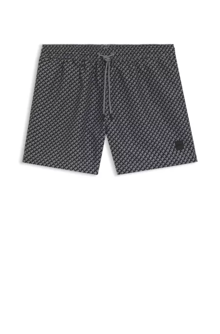 Micro-print swim shorts with logo badge