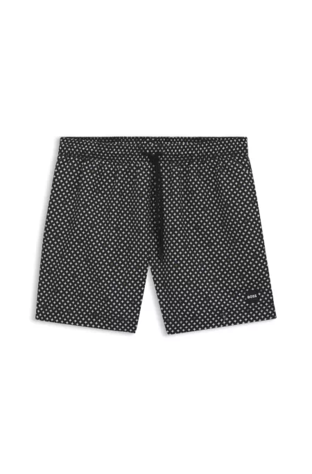 Printed swim shorts with logo badge