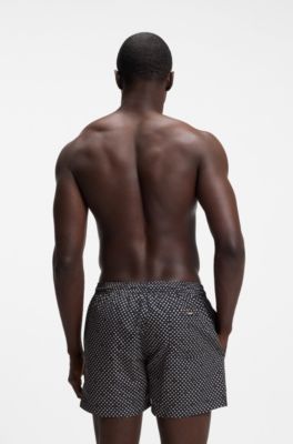 Printed swim shorts with logo badge, Black Patterned
