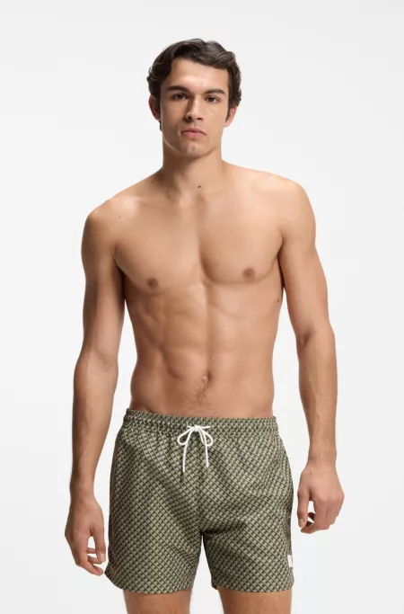 Micro-print swim shorts with logo badge