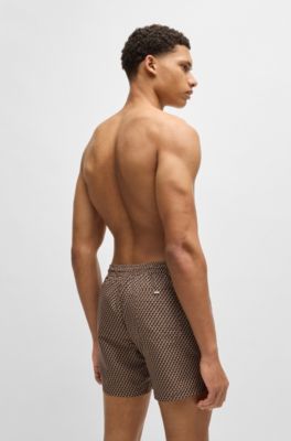 Micro-print swim shorts with logo badge, Beige