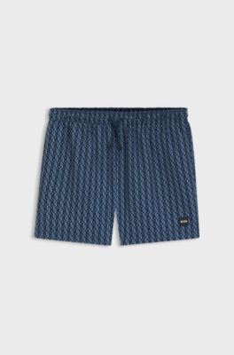 Printed swim shorts with logo badge, Blue Patterned