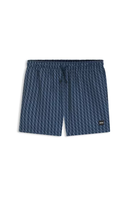 Printed swim shorts with logo badge