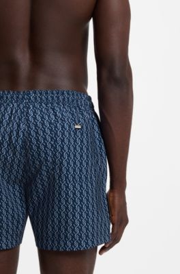 Printed swim shorts with logo badge, Blue Patterned