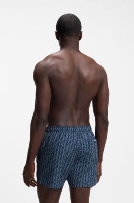 Printed swim shorts with logo badge, Blue Patterned