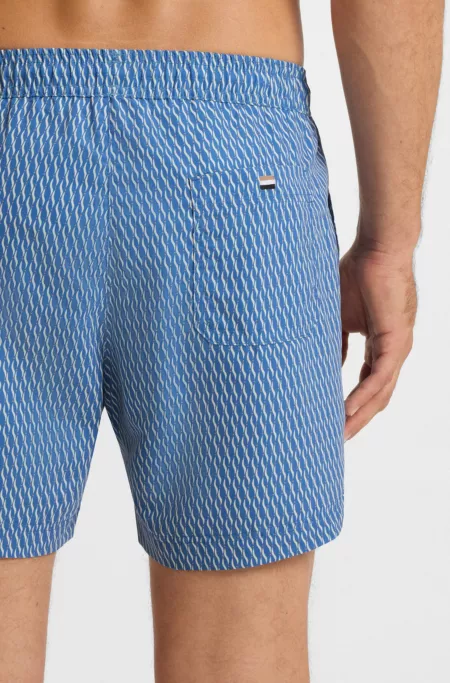 Printed swim shorts with logo badge