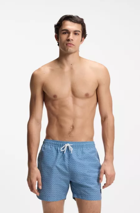 Short de bain à micro-imprimé et badge logoté