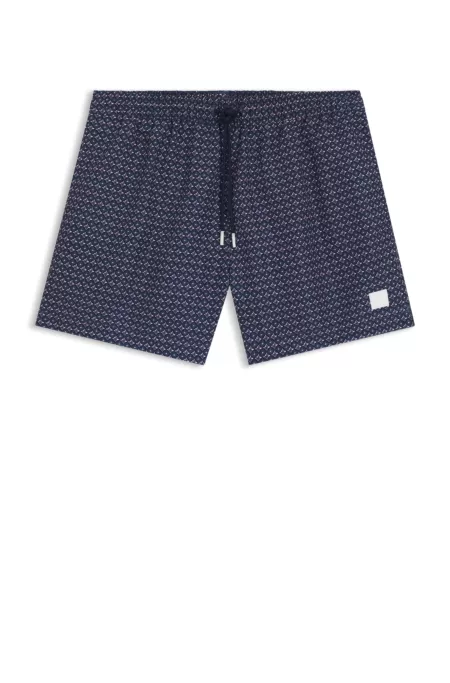 Short de bain à micro-imprimé et badge logoté