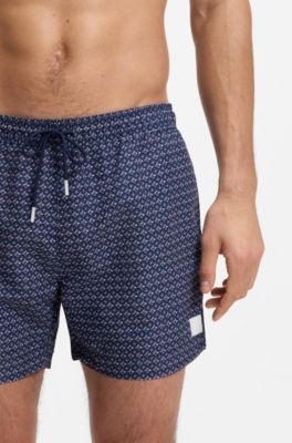 Micro-print swim shorts with logo badge, Blue