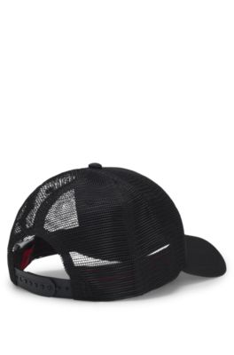 Twill trucker cap with red logo label, Black
