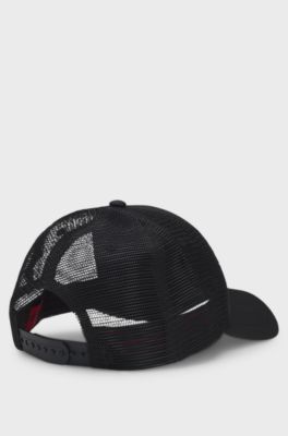 Twill trucker cap with red logo label, Black
