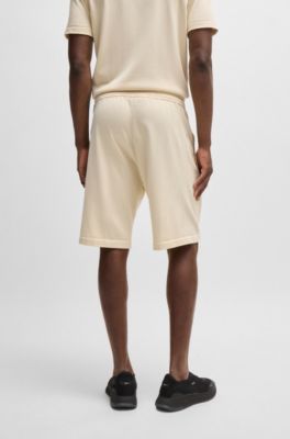 BOSS - Regular-fit shorts with double-monogram badge 