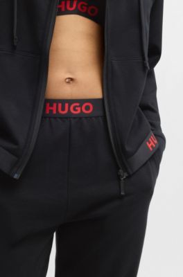 Jogginghose aus Baumwoll-Mix mit Logos am Bund, Schwarz
