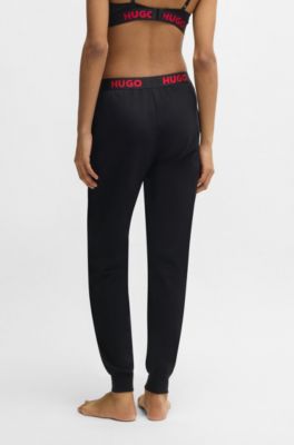 Jogginghose aus Baumwoll-Mix mit Logos am Bund, Schwarz