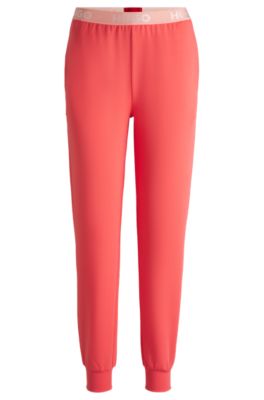 Pantaloni della tuta in misto cotone con elastico in vita con logo, Rosso chiaro
