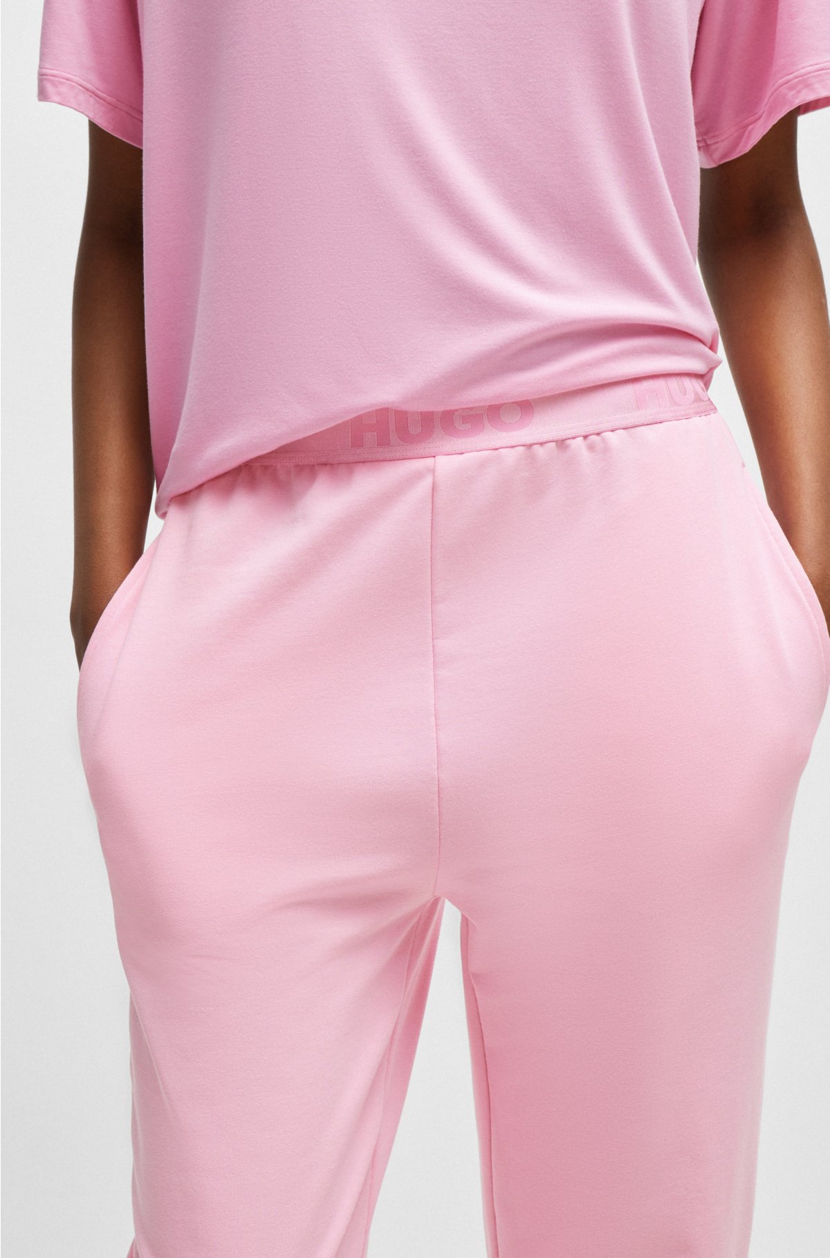 Cotton-blend tracksuit bottoms with logo waistband, light pink