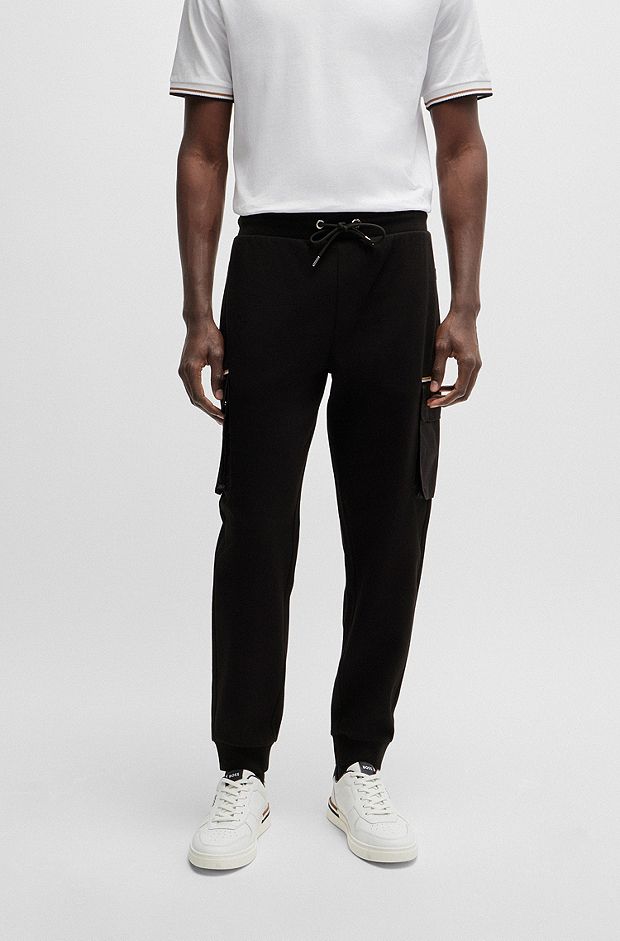 Cotton-blend tracksuit bottoms with contrast pockets, Black