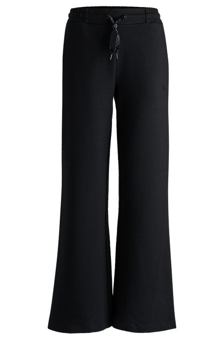 Tracksuit bottoms in a cotton blend with piped details, Black
