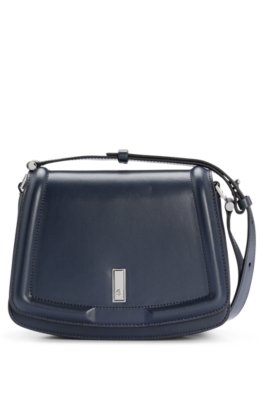 Besace en cuir avec garnitures en métal emblématiques et monogramme