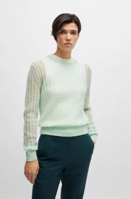 Fine-gauge sweater in textured wool with cable structure