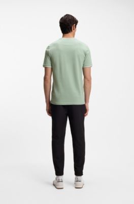 T-shirt van stretchkatoen met strepen en logo, Kalk