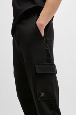 HUGO - Stretch-cotton tracksuit bottoms with stacked logo