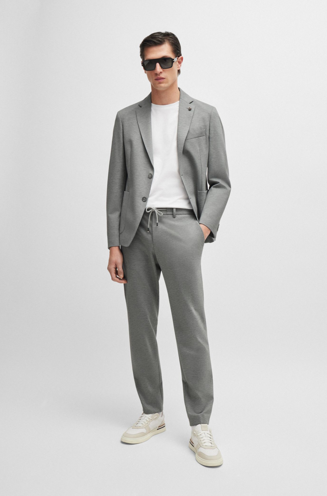 Slim-fit trousers in melange stretch jersey